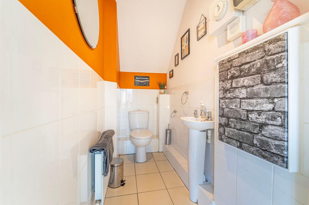 Cloaks/ downstairs WC