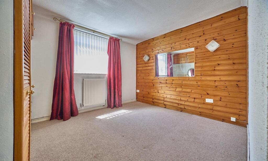 BEDROOM TWO TO FRONT