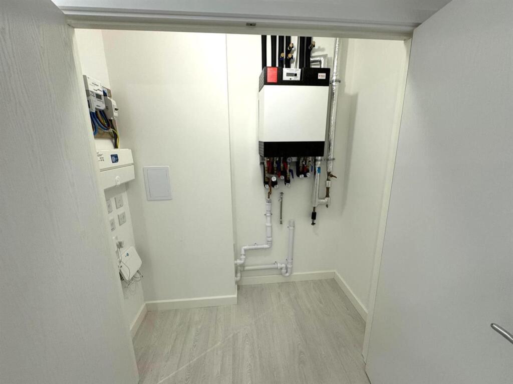 utility cupnoard.jpg