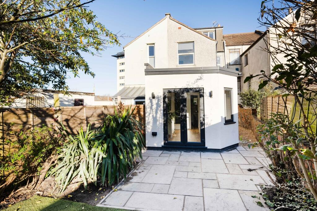 A beautifully maintained garden area with ample...