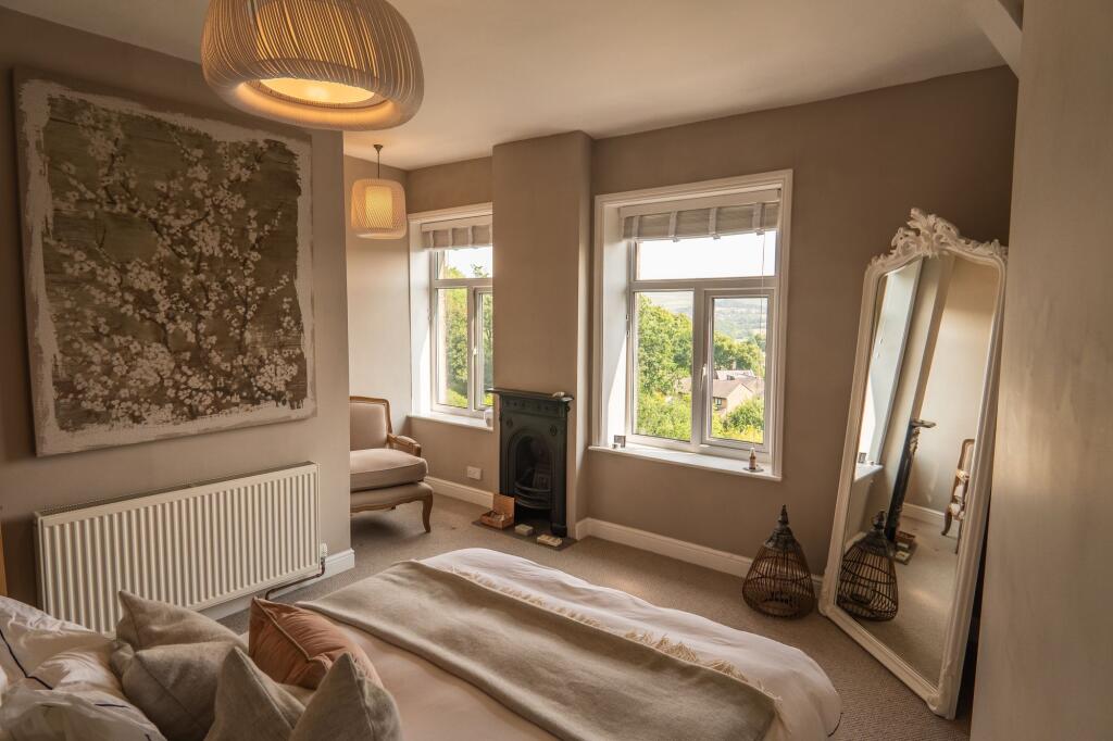 Spacious and Serene Master Bedroom