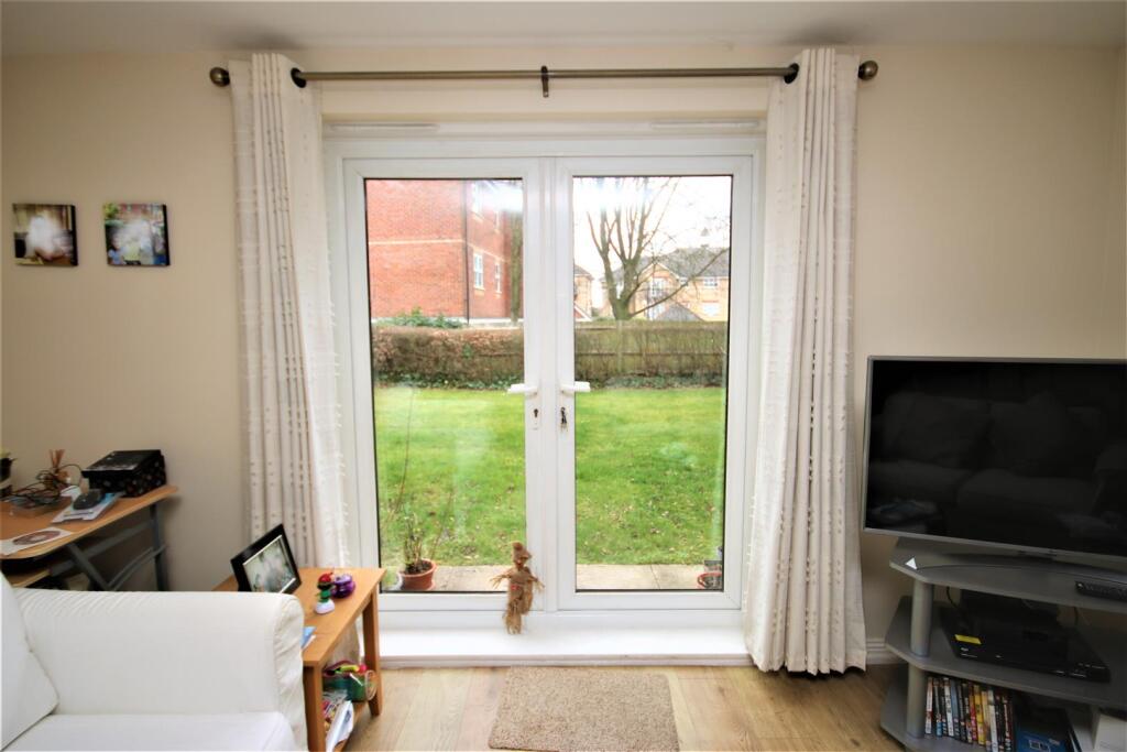 FRENCH DOORS TO COMMUNAL GARDENS: