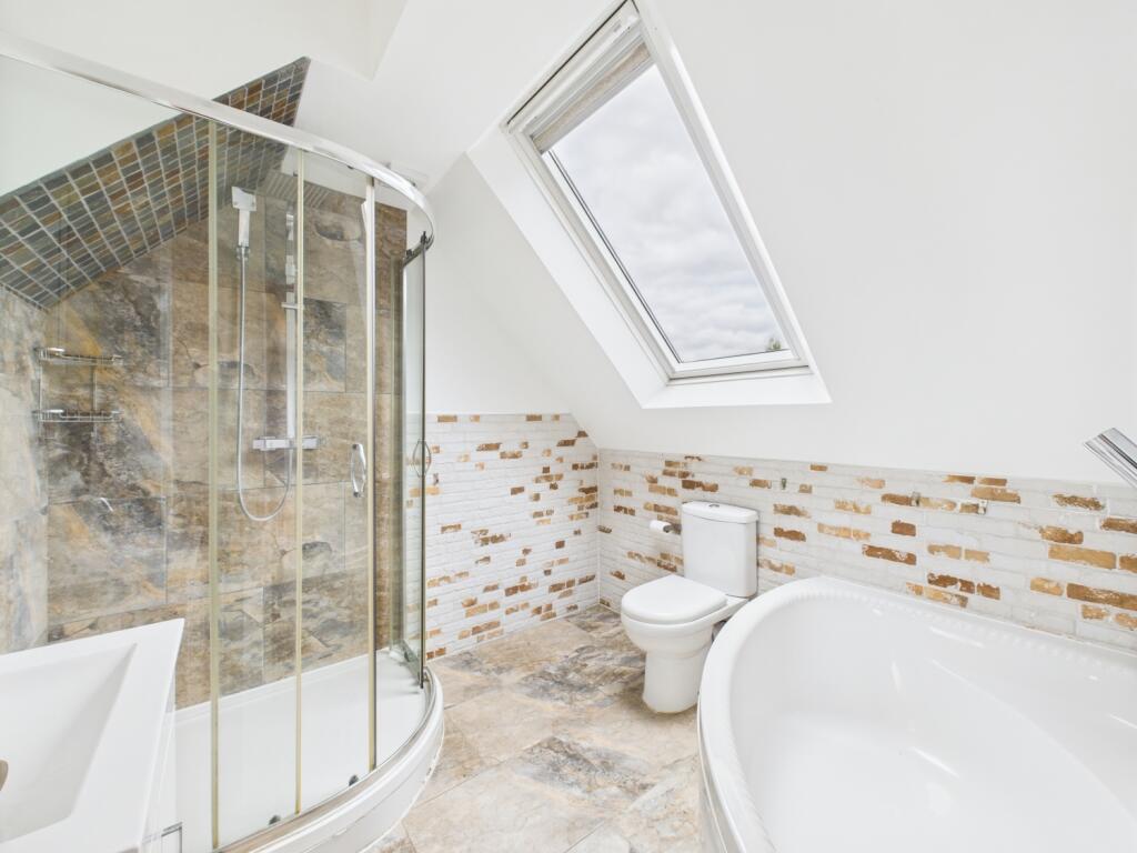 Bathroom to bedroom one