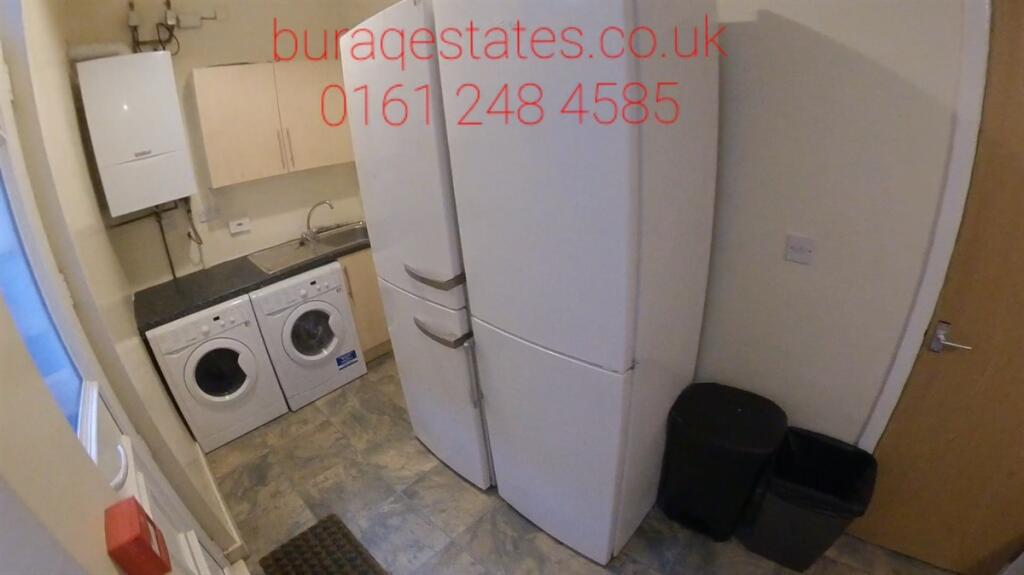 Compact and functional kitchen space featuring ...