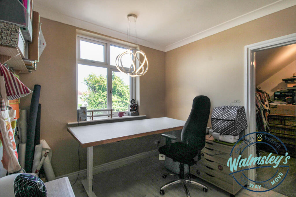 Bedroom three with walk in dressing room