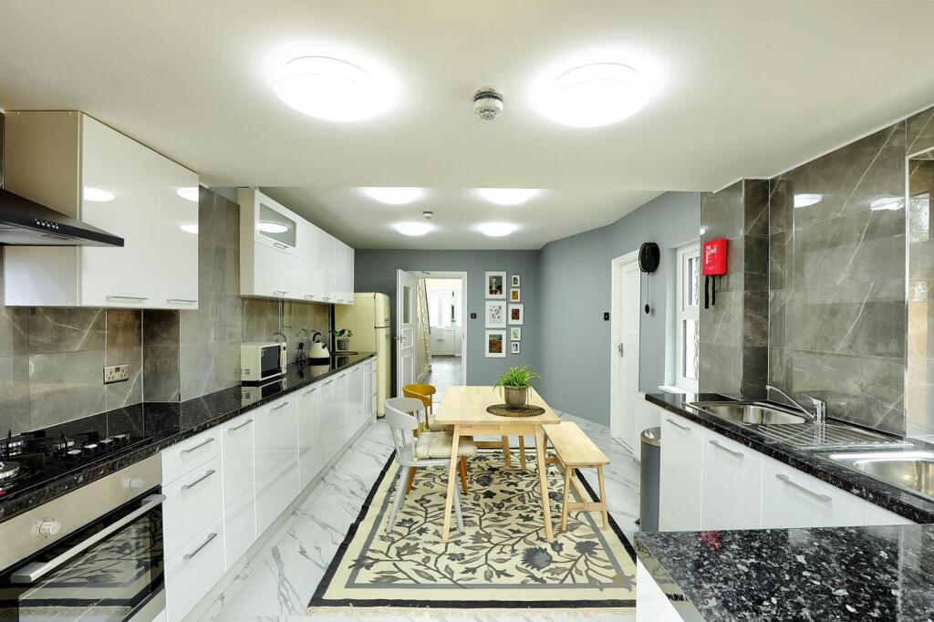 Central communal area with modern kitchen