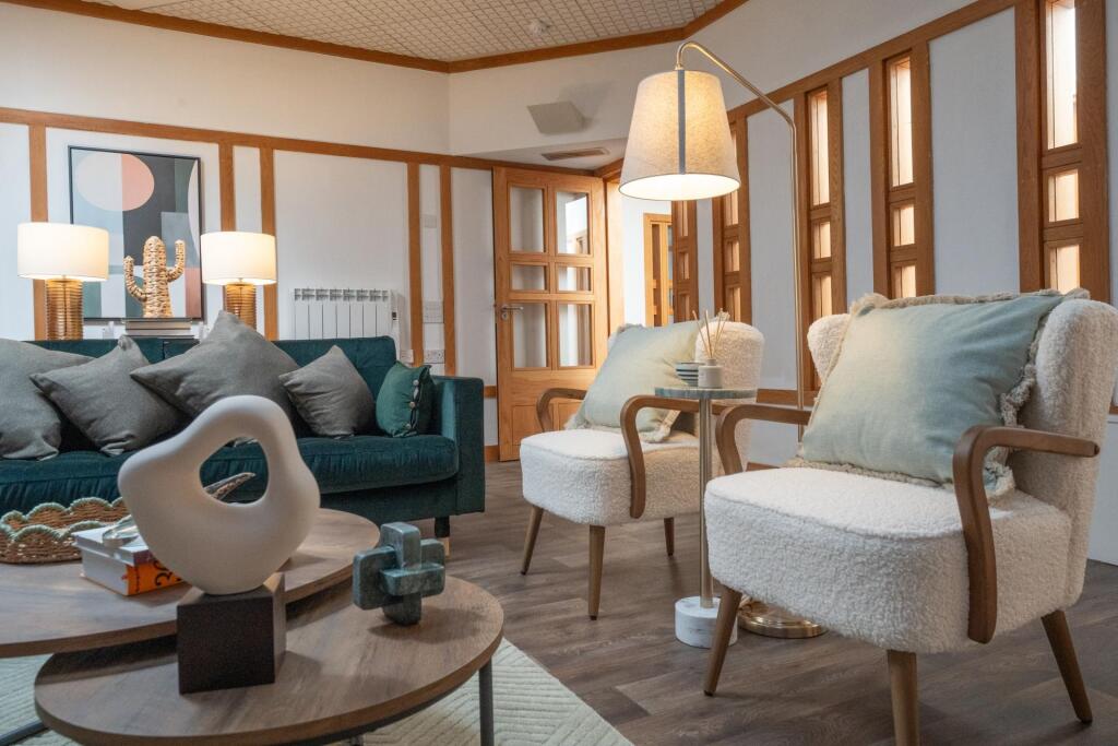 A stylish and inviting living room featuring a ...