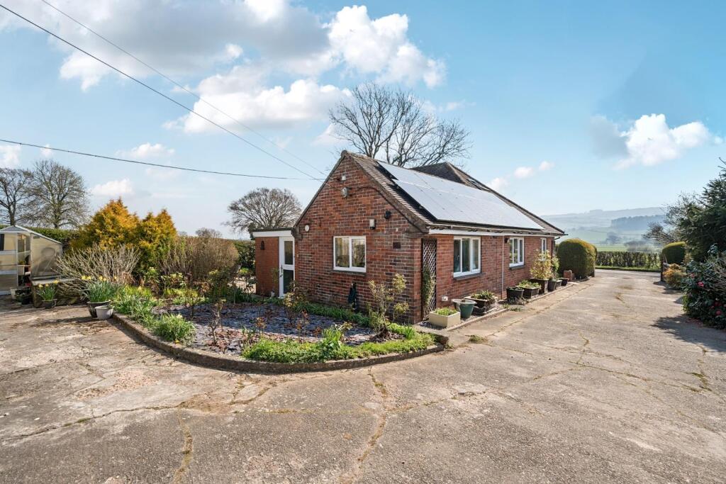 Driveway view of property.jpg