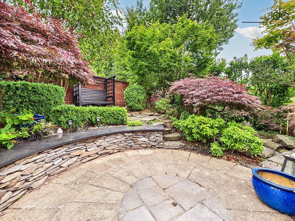 Landscaped Japanese style garden and seating area