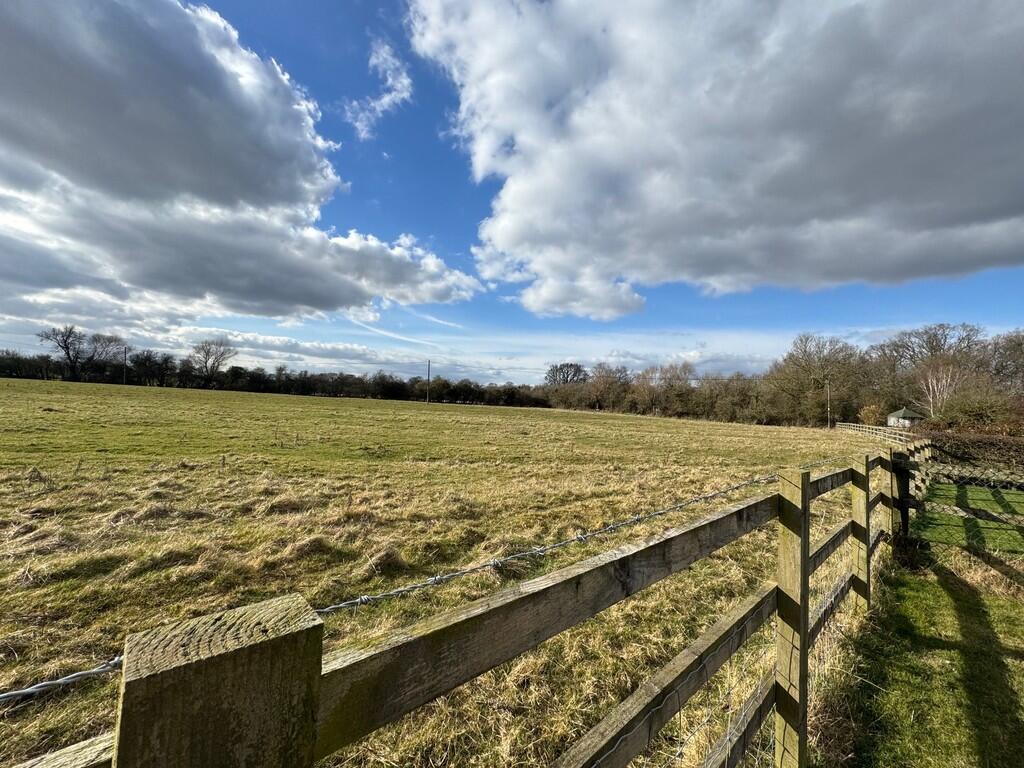 Farmland to rear
