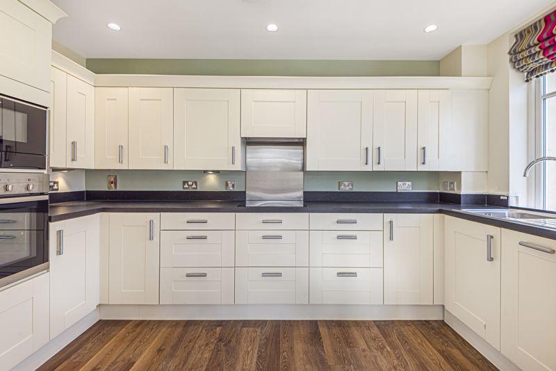 Kitchen with built-in appliances