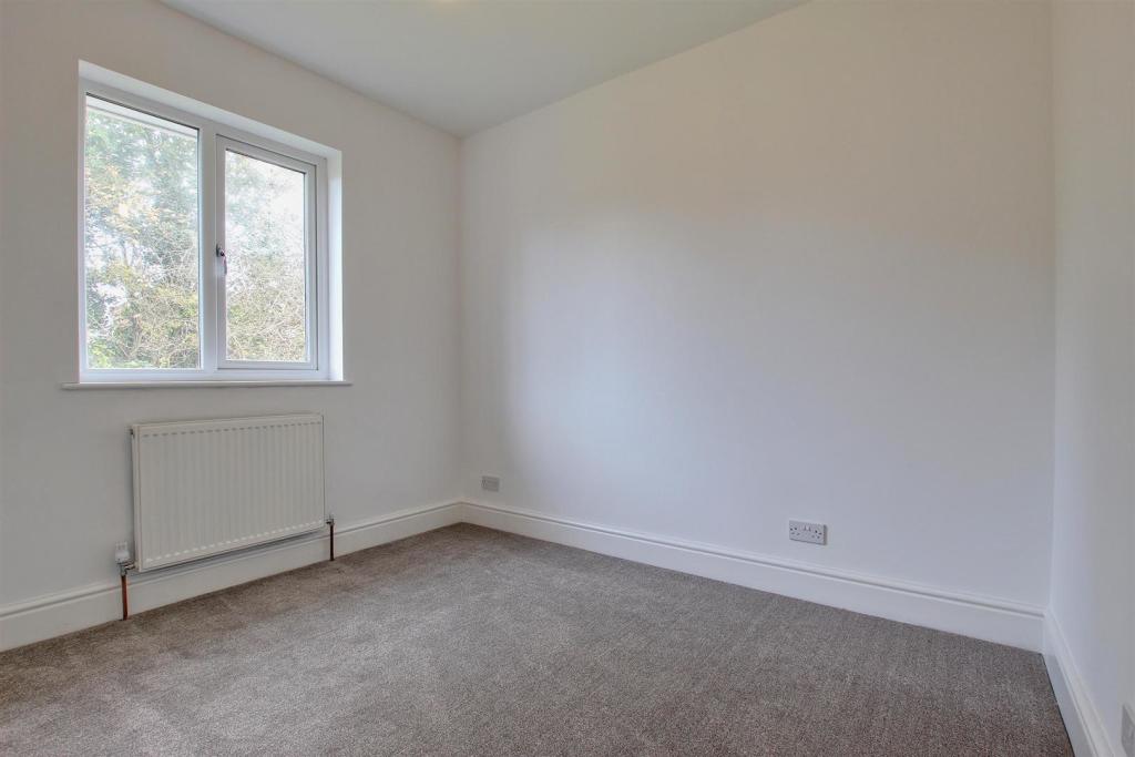 BEDROOM 1 (REAR)