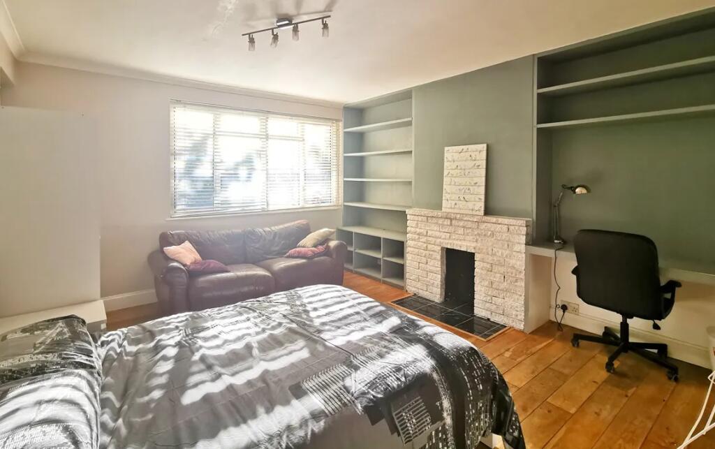 Bright and inviting master bedroom featuring a ...