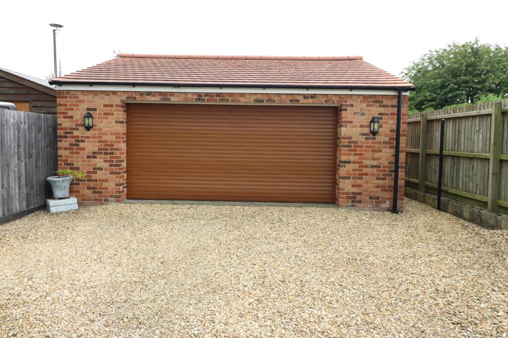 Double Garage  with separate WC