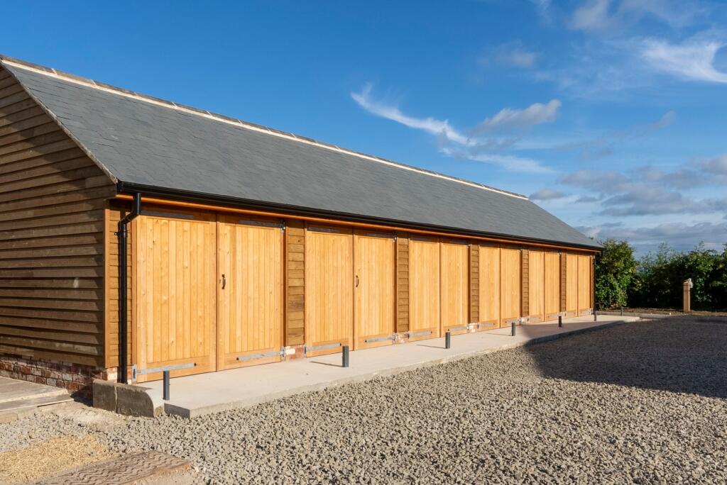 Large garage and additional allocated parking