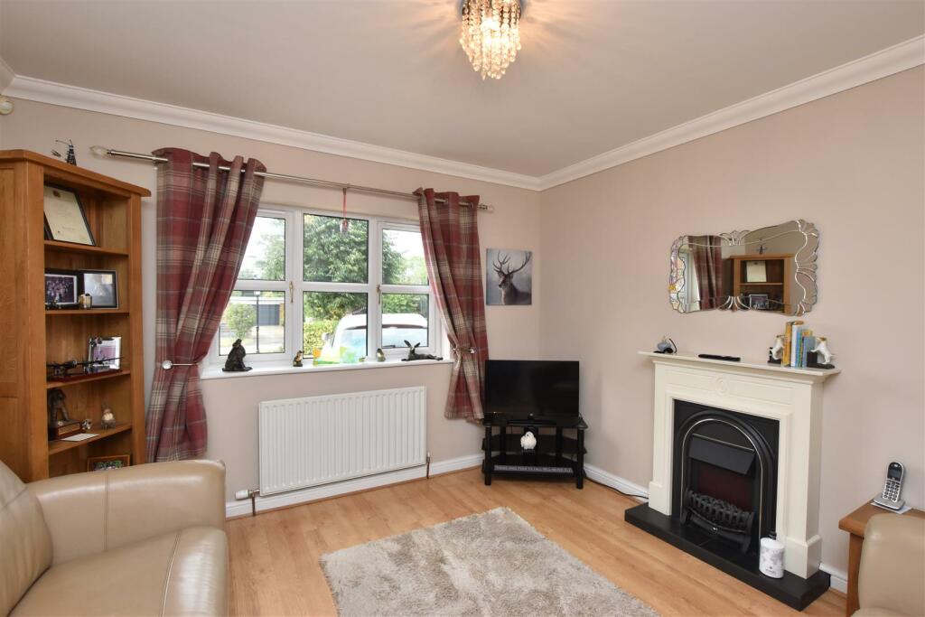 SITTING ROOM (FRONT)