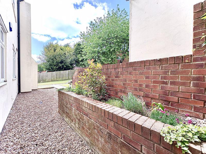 ENTRANCE/SMALL GARDEN AREA