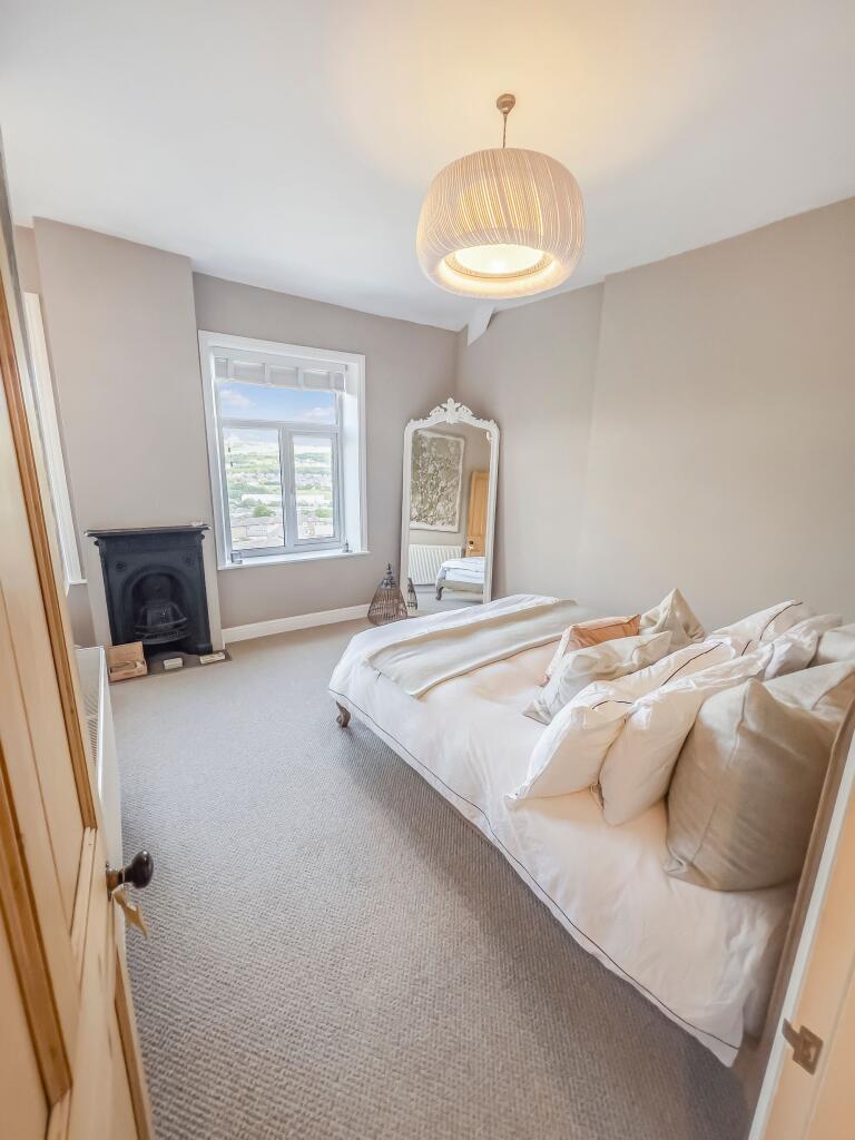 Spacious and Serene Master Bedroom