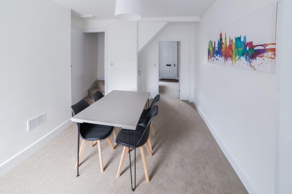 This inviting communal lounge area features a s...