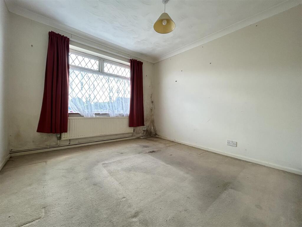 ALTERNATE_VIEW_OF_BEDROOM_ONE[1].jpeg