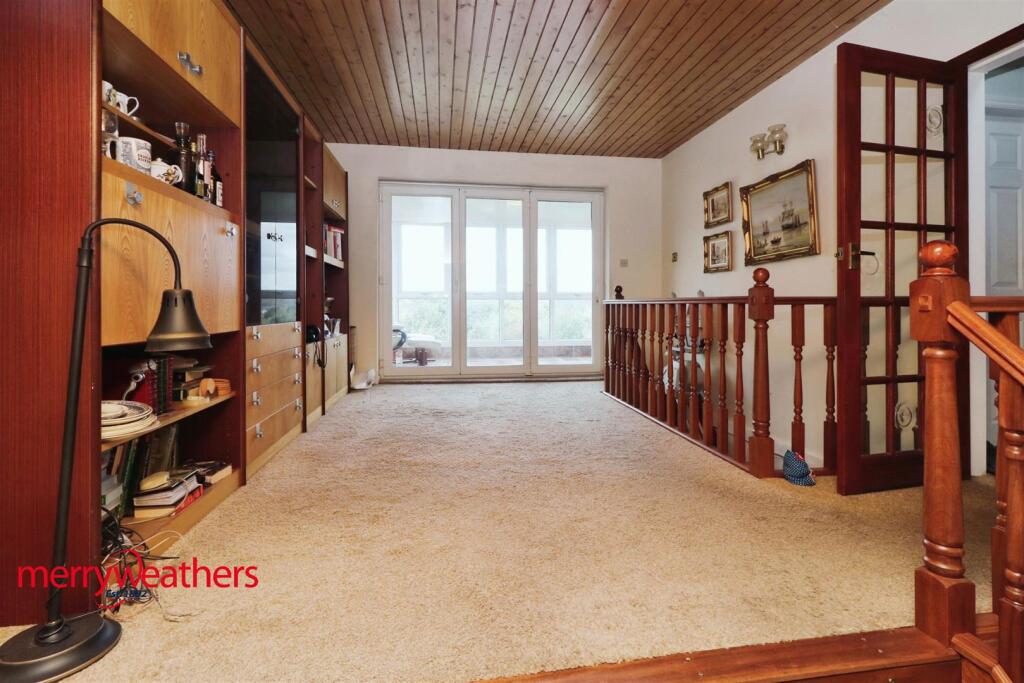 SPLIT-LEVEL LOUNGE/DINING ROOM