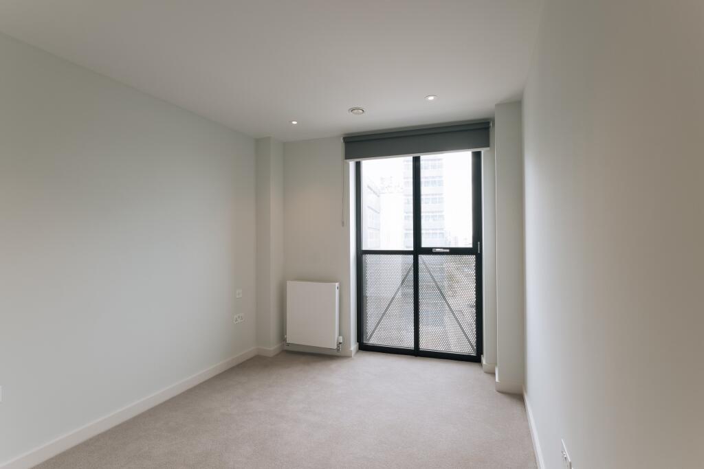 Experience tranquility and style in this sunlit modern space.