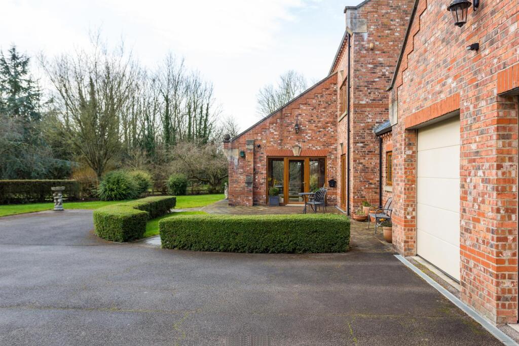 Drive and Integrated Garage