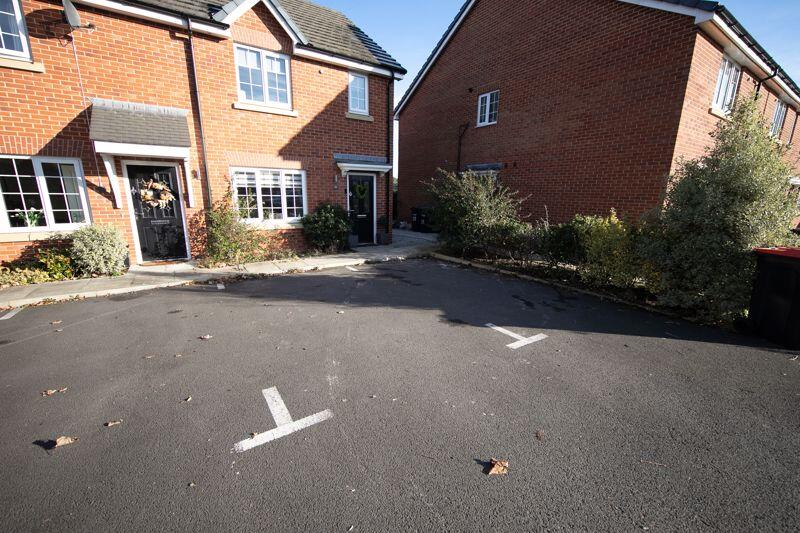 2 designated parking spaces