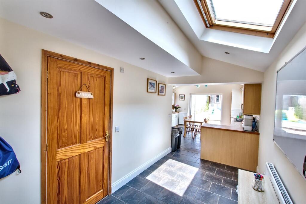 Area leading to kitchen and Bathroom