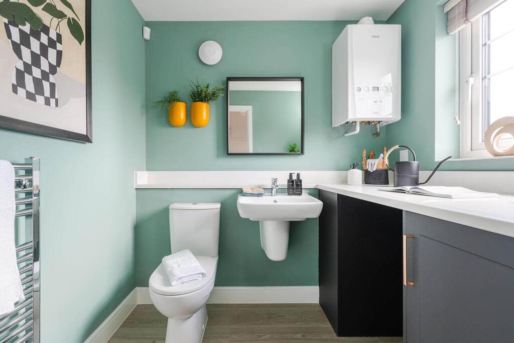 A guest cloakroom completes the ground floor