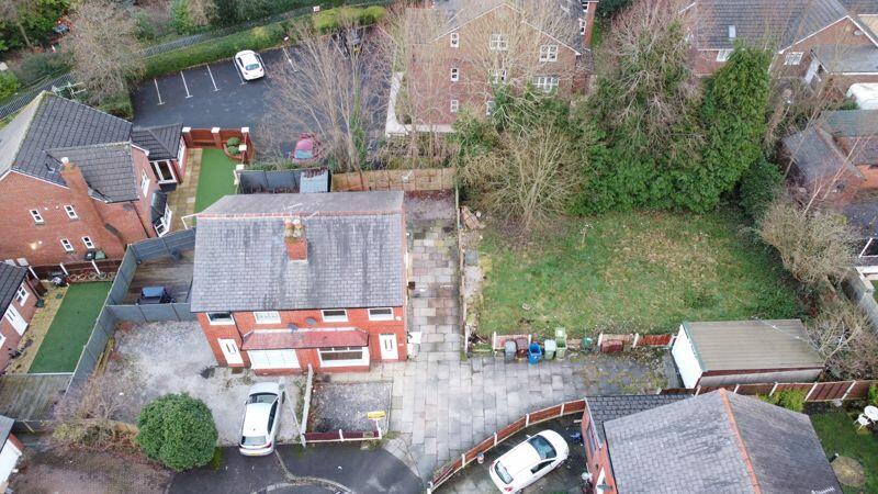 Elevated Front &amp; Land to Side