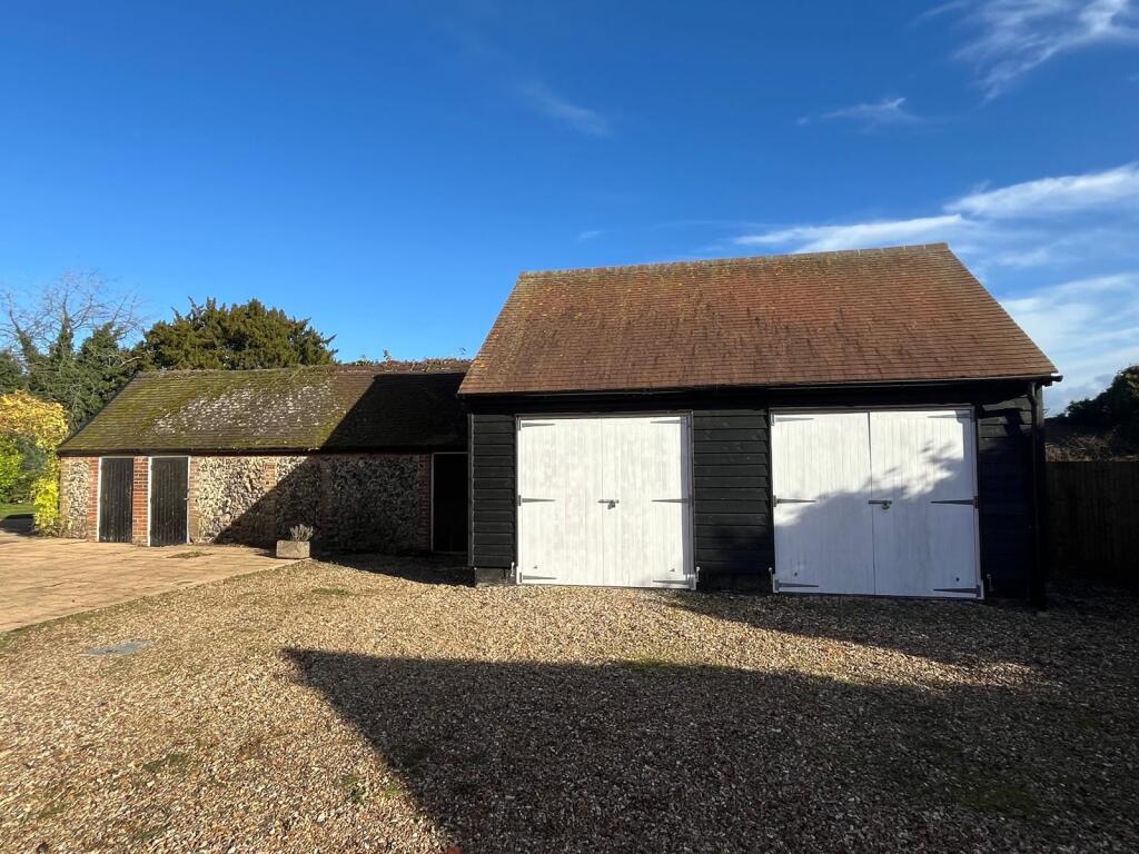 Double garage and additional storage