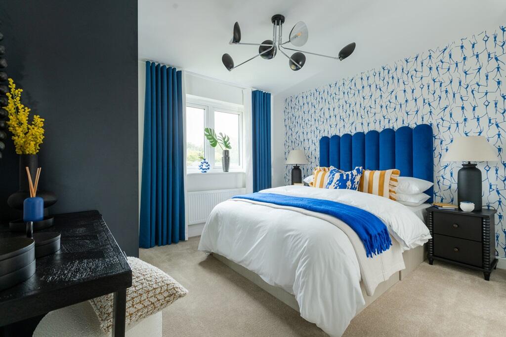 Relax and unwind in the spacious main bedroom with it's own en suite