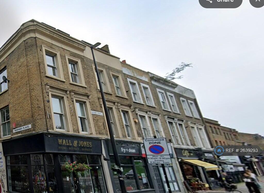 Exterior.  Flat Is Very Top Floor, In The Eaves. 