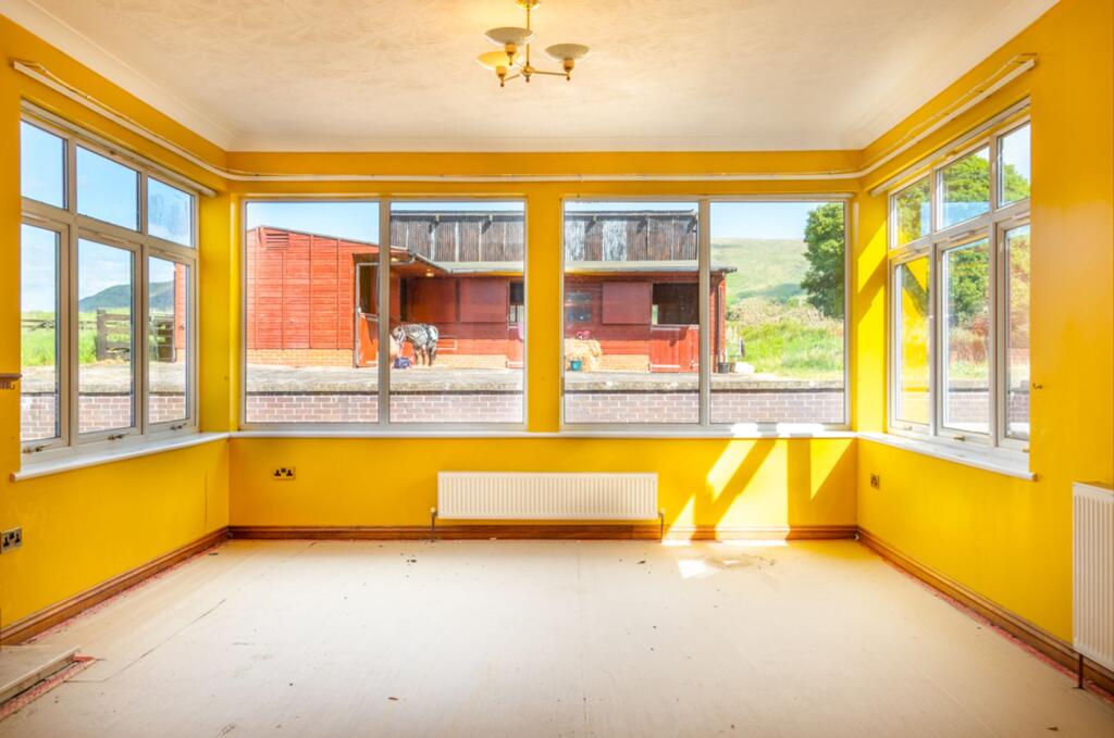 Sunroom with stable view