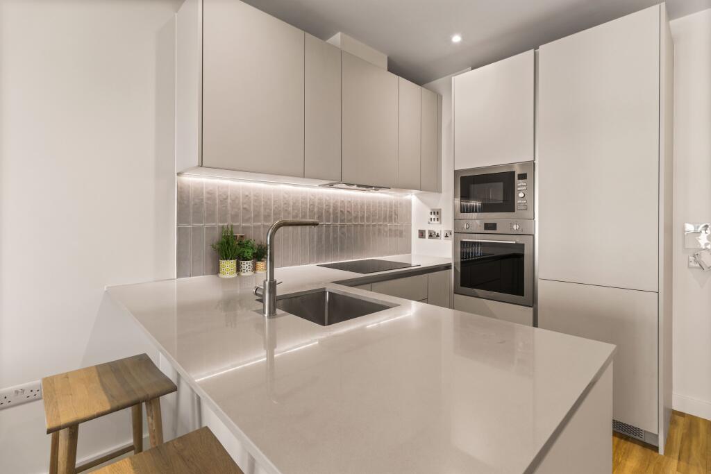 Explore this modern kitchen boasting style and efficiency.