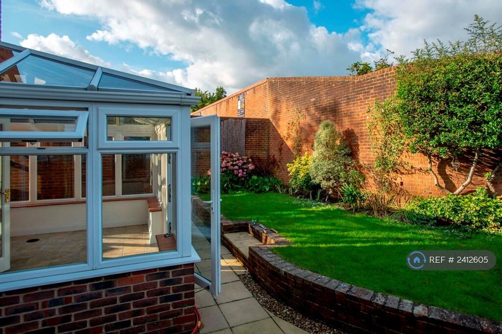 Conservatory And Back Garden 