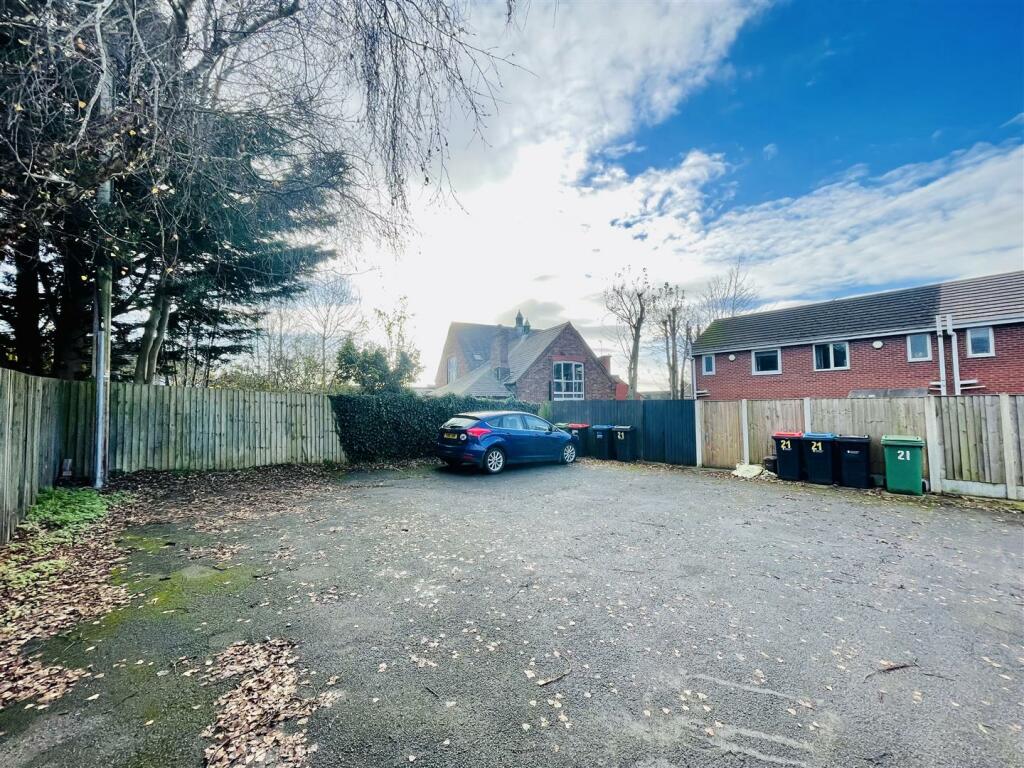 Parking To The Rear Aspect