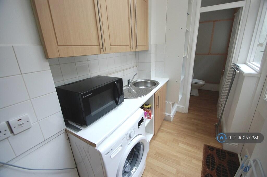 Utility Room And w.c.