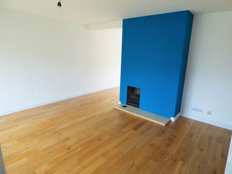 Living room (shown vacant 2023)