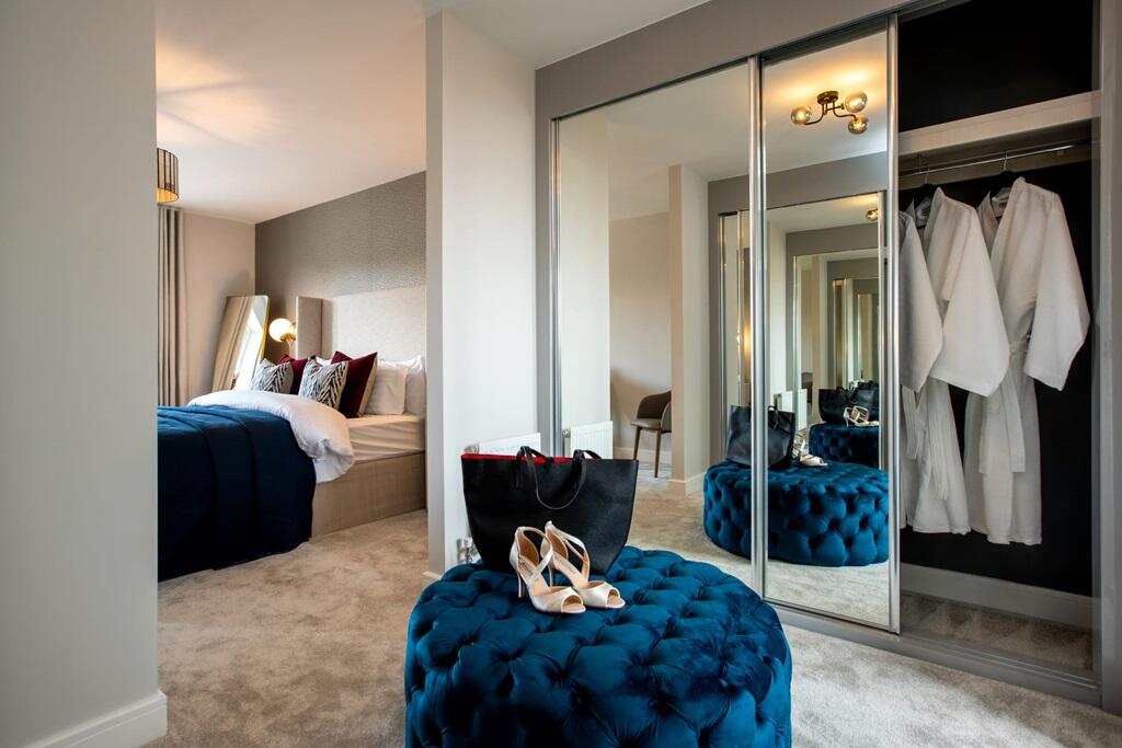 A useful dedicated dressing area in the main bedroom