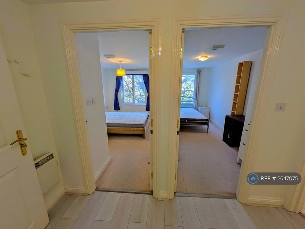 Corridor To Two Rooms