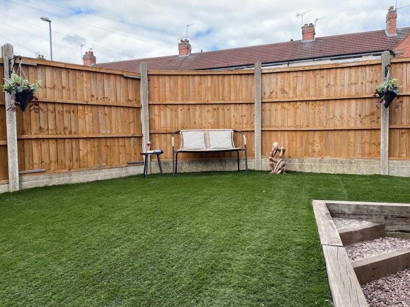 A well-maintained private garden featuring lush...