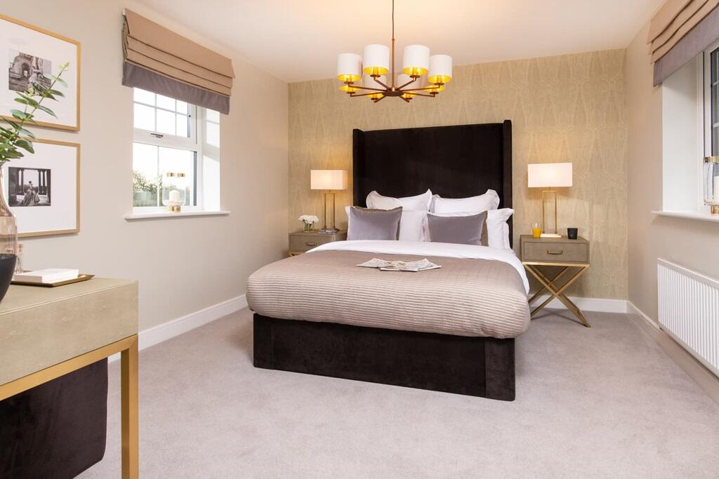 The large spacious main bedroom holds space for wardrobes