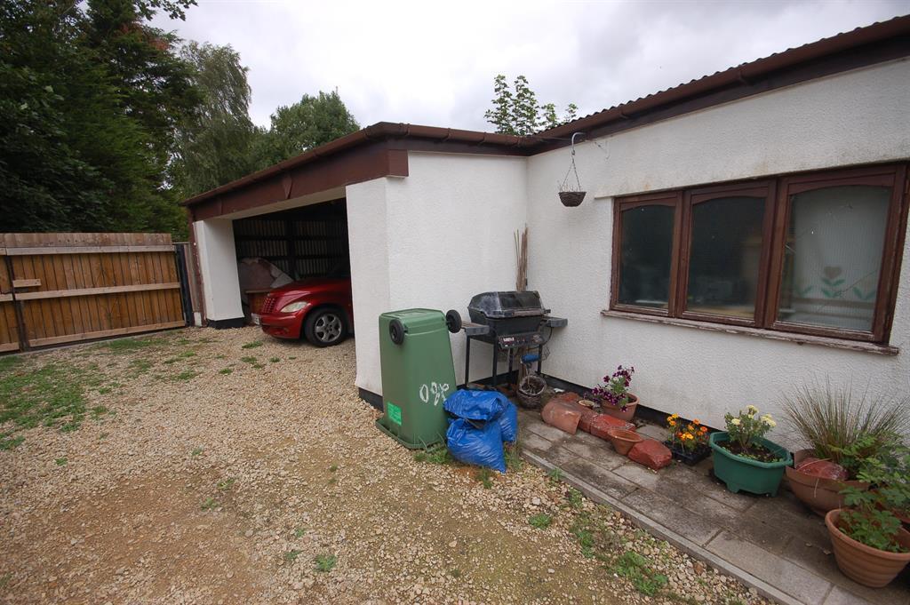 DOUBLE CARPORT/GARAGE