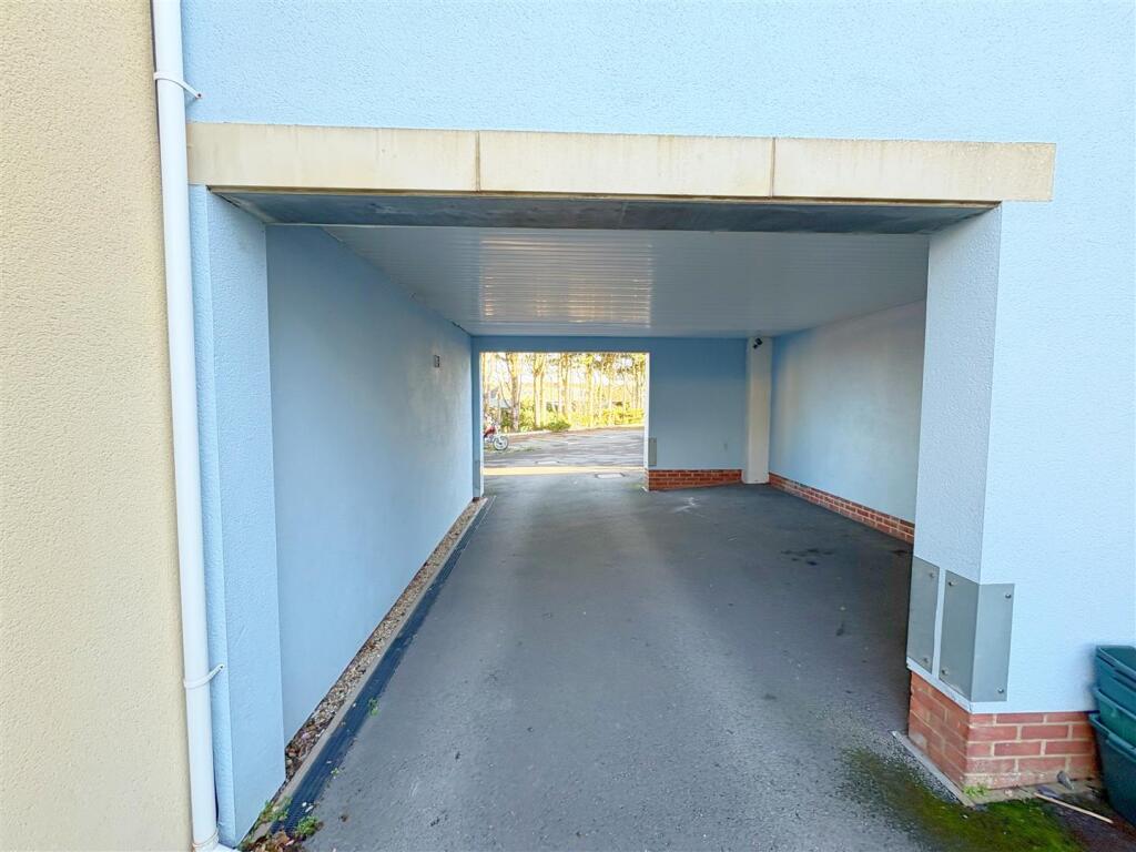 Access through carport to parking space.jpg