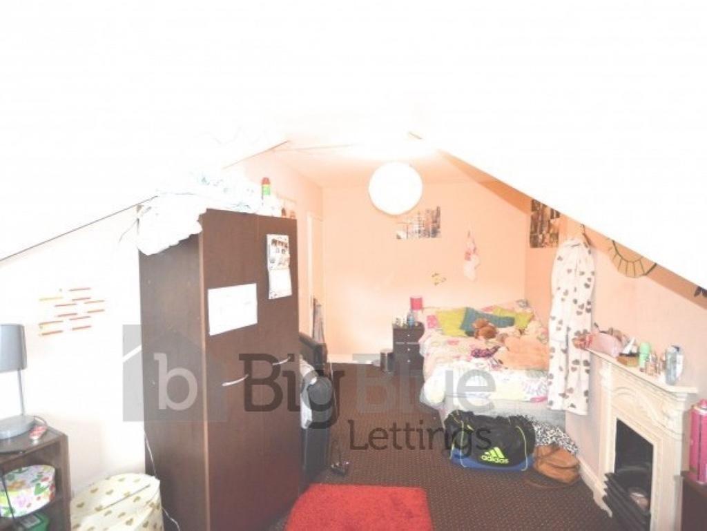 A compact and functional single toilet room wit...