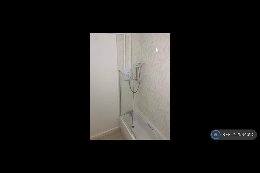 Bathroom With Shower Over Full Sized Bath