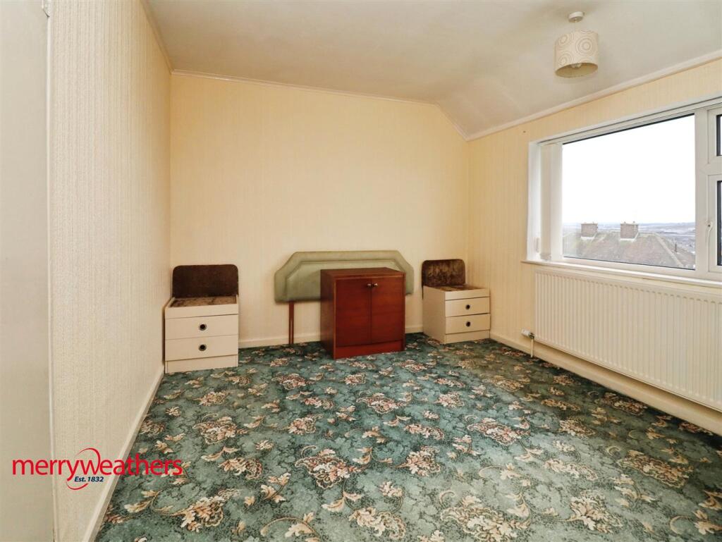 FRONT BEDROOM ONE