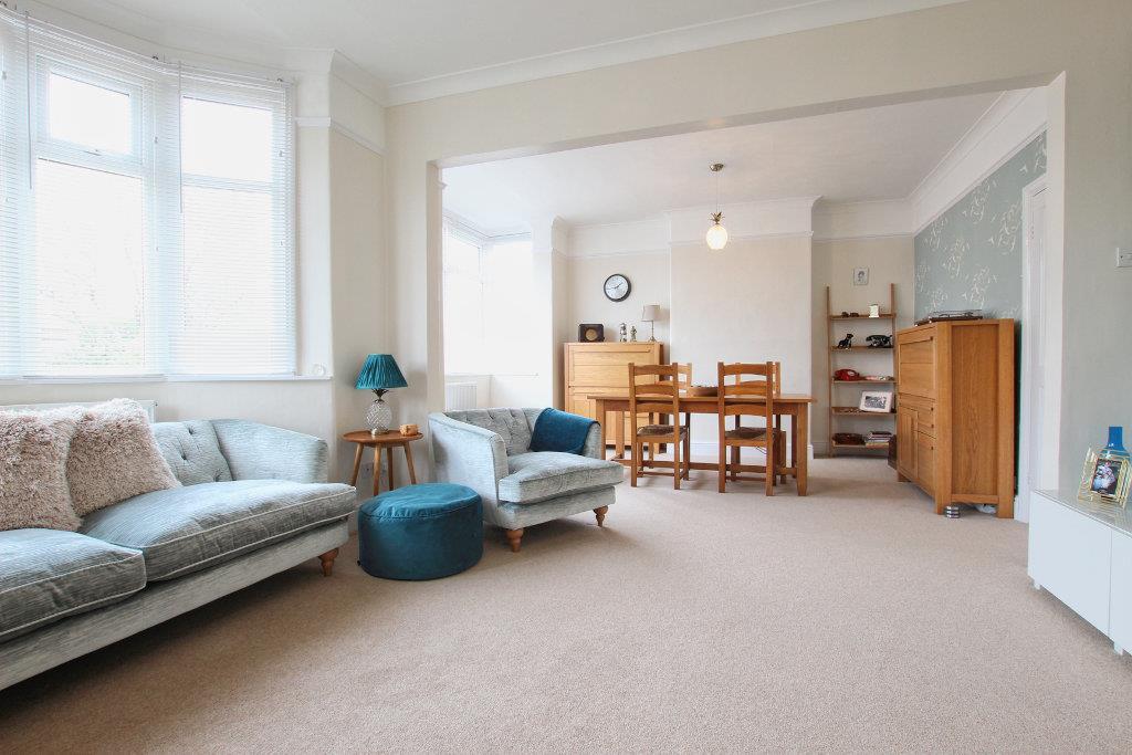 THROUGH LOUNGE AND DINING ROOM